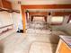 The RV living room features an couch, cabinets, and open floor plan at 1233 Belleair Rd, Clearwater, FL 33756