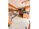 The RV living room features an couch, cabinets, and open floor plan to the kitchen at 1233 Belleair Rd, Clearwater, FL 33756