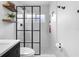 Stylish bathroom featuring modern fixtures, open shelving and a glass enclosed shower at 13409 Fawn Springs Dr, Tampa, FL 33626
