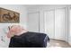 Spacious bedroom featuring bright natural light and convenient closet storage at 13409 Fawn Springs Dr, Tampa, FL 33626
