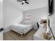 Comfortable bedroom with a desk area and natural light creating a serene atmosphere at 13409 Fawn Springs Dr, Tampa, FL 33626