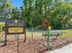 Fawn Lake recreational area with playground and bench seating at 13409 Fawn Springs Dr, Tampa, FL 33626