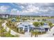 Aerial shot shows pool and waterway within the community at 1586 Running Tide Pl, Sarasota, FL 34240