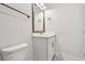 Clean bathroom featuring a single sink vanity, modern fixtures, and a minimalist design at 1586 Running Tide Pl, Sarasota, FL 34240