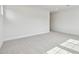 Bright carpeted bedroom featuring ample natural light, ready for personal touches and comfort at 1586 Running Tide Pl, Sarasota, FL 34240