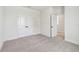 Spacious bedroom with plush carpet, double closets, and neutral paint at 1586 Running Tide Pl, Sarasota, FL 34240