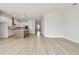 Spacious living room connected to a modern kitchen, ideal for entertaining and Gathering gatherings at 1586 Running Tide Pl, Sarasota, FL 34240