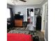 Main bedroom with wood-look floors and an en-suite bathroom at 1663 Cambridge Dr, Clearwater, FL 33756