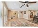 Expansive living area with hardwood floors, recessed lighting, and an open layout at 1666 Pine Pl, Clearwater, FL 33755