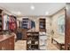 A large walk-in closet includes custom shelves, drawers, and hanging racks at 1666 Pine Pl, Clearwater, FL 33755