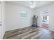 Bonus room displays the water heater, access to a pool, and a door to a utility room at 1713 W Louisiana Ave, Tampa, FL 33603