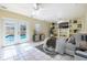 Main bedroom features custom built-ins, French doors to pool, and neutral decor at 1713 W Louisiana Ave, Tampa, FL 33603