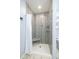 Beautifully renovated shower with a built in seat at 1713 W Louisiana Ave, Tampa, FL 33603