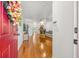 Inviting foyer with hardwood floors that leads into the living and dining areas at 1749 Sedgefield Ct, Odessa, FL 33556