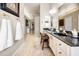 Well-appointed bathroom with dual sinks, vanity, and easy access to shower at 1802 Oak Ridge Rd, Safety Harbor, FL 34695