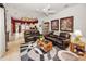 Inviting living room with leather furniture, open to kitchen; perfect for entertaining and relaxing at 1802 Oak Ridge Rd, Safety Harbor, FL 34695