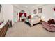 Spacious main bedroom with tray ceiling, cozy furnishings, and ample natural light at 1802 Oak Ridge Rd, Safety Harbor, FL 34695