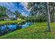 Scenic backyard water view from waterfront home in Safety Harbor, Florida at 1802 Oak Ridge Rd, Safety Harbor, FL 34695