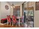 Well-lit dining space with stylish furnishings and access to outdoor patio at 18816 Tracer Dr, Lutz, FL 33549