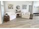 Bright living room featuring neutral walls, modern floors, and comfortable white furniture at 19709 Wyndham Lakes Dr, Odessa, FL 33556