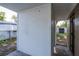 The back patio offers a peek at the backyard and the storage shed at 2004 Windsor Way, Tampa, FL 33619