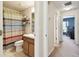 Bathroom features a shower, vanity with sink, and tile flooring at 2347 Willimette Dr, Wesley Chapel, FL 33543
