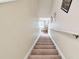Carpeted staircase leading to the upper level of the home at 2347 Willimette Dr, Wesley Chapel, FL 33543