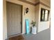 Charming front door with decorative accents and a welcoming entrance at 3044 Red Oak Ct # 204, Palm Harbor, FL 34684
