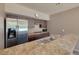 Cabana kitchenette offers updated appliances and plenty of counter space for preparing snacks for the community pool at 3044 Red Oak Ct # 204, Palm Harbor, FL 34684