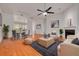 Spacious living area with dining space, wood floors, and modern decor at 3044 Red Oak Ct # 204, Palm Harbor, FL 34684