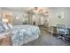 Spacious main bedroom featuring a ceiling fan, and ample closet space at 3055 Casa Del Sol Cir # 202, Clearwater, FL 33761