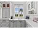 Bright kitchen featuring ample counter space, a coffee station, and modern appliances at 3125 Christophers Watch Ln, Ruskin, FL 33570