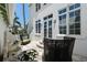 Charming courtyard with brick pavers, stone fountain, and comfortable outdoor seating at 3125 Christophers Watch Ln, Ruskin, FL 33570