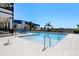 Stunning pool with poolside seating and open space for relaxation and enjoyment at 3125 Christophers Watch Ln, Ruskin, FL 33570