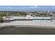 Beachfront restaurant with covered outdoor seating and ocean views, perfect for relaxed dining at 3125 Christophers Watch Ln, Ruskin, FL 33570