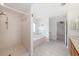 Bright bathroom with a stand-up shower and a garden tub at 31645 Bugle Ln, Wesley Chapel, FL 33543