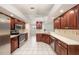 Well-equipped kitchen featuring stainless steel appliances and ample cabinet space at 31645 Bugle Ln, Wesley Chapel, FL 33543