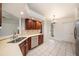 Bright kitchen with ample countertop space and modern stainless steel dishwasher at 31645 Bugle Ln, Wesley Chapel, FL 33543