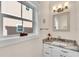 Cozy bathroom with marble countertops and views of the outside at 340 6Th E St, Bradenton, FL 34208