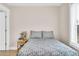 Cozy bedroom with comfortable queen-sized bed and a nightstand at 340 6Th E St, Bradenton, FL 34208