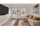 Comfortable living room with large windows and stylish decor at 340 6Th E St, Bradenton, FL 34208