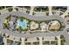 Stunning aerial view of amenities including a community pool and playground at 340 Sapphire Lake Dr # 202, Bradenton, FL 34209