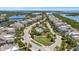 Scenic aerial view of community pool, waterways, and beautiful neighborhood at 340 Sapphire Lake Dr # 202, Bradenton, FL 34209