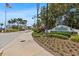 The Harbour Isle Anna Maria Sound community entrance boasts beautiful landscaping at 340 Sapphire Lake Dr # 202, Bradenton, FL 34209
