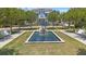 Inviting two-story home with a fountain and landscaped front yard at 340 Sapphire Lake Dr # 202, Bradenton, FL 34209