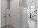 Hallway with a residential elevator and staircase at 340 Sapphire Lake Dr # 202, Bradenton, FL 34209