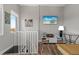 Comfortable living area with stairs, a TV, and stylish decor at 340 Sapphire Lake Dr # 202, Bradenton, FL 34209