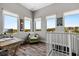 Second story office featuring a desk, an arm chair and windows with a scenic view at 340 Sapphire Lake Dr # 202, Bradenton, FL 34209