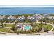 Scenic aerial view of community pool, waterways, and beautiful neighborhood at 340 Sapphire Lake Dr # 202, Bradenton, FL 34209