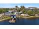 Community pool with well-maintained landscaping and waterfront access at 340 Sapphire Lake Dr # 202, Bradenton, FL 34209